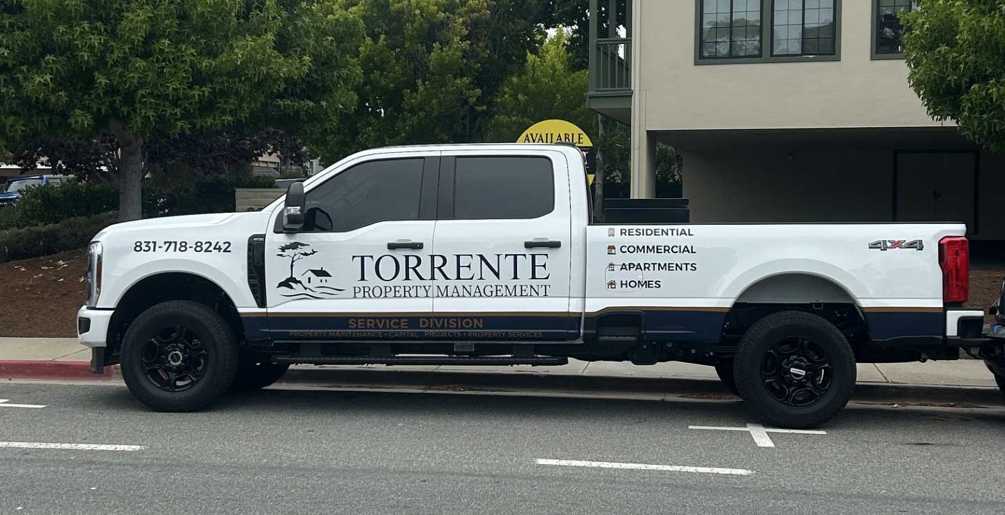 Torrente Property Management service truck — Monterey Bay Area property maintenance and repairs